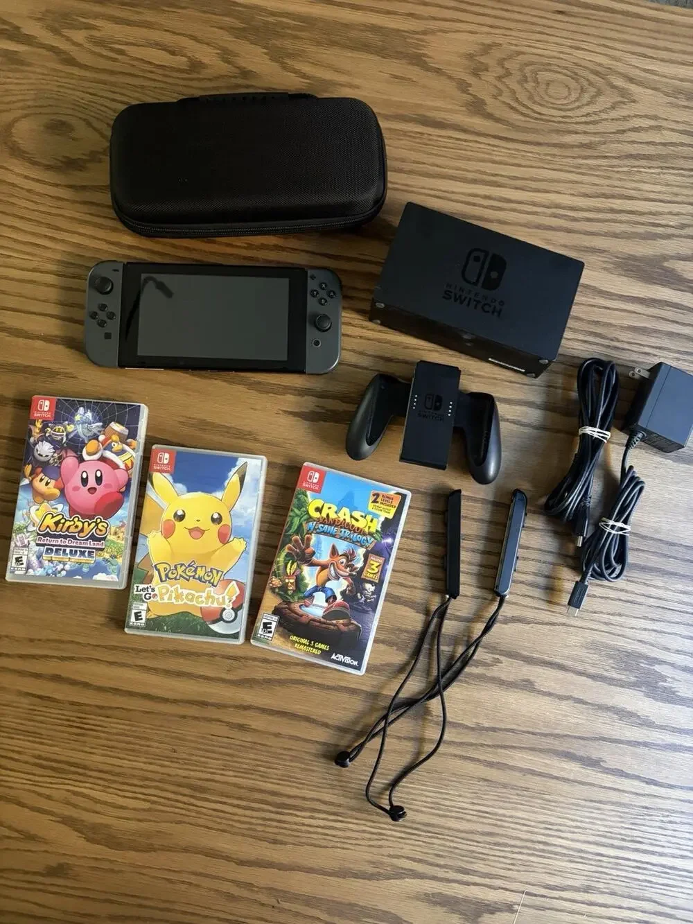 Nintendo Switch Console Gray Bundle with Games Kirby Pikachu Crash and Case